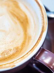 Soft and delicate milk froth in a cup of coffee