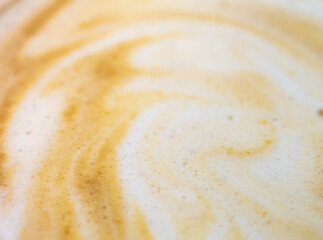 Texture surface of soft and delicate milk froth in a cup of coffee