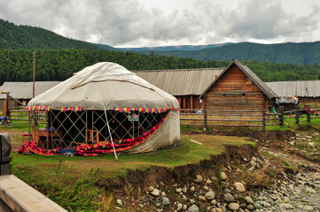 Mountain and forest, grassland scenery, yurt in xinjiang, China