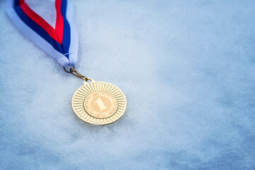 Gold, silver and bronze medal with winter nature in background. Sport trophy concept photo for...