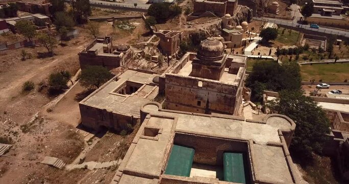 4K Aerial Footage View to the Shri Katas Raj complex of several Hindu temples, Punjab, Pakistan