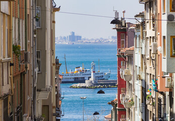 Scenic view of a boat in between two residential buildings in Kadikoy Istanbul, Turkey