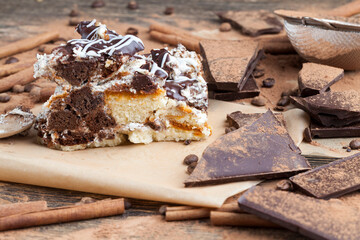 a multi-layered cake made of chocolate and cream cakes
