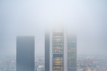 Views of the Castellana in the city of Madrid during a very cloudy winter day, with views of the...