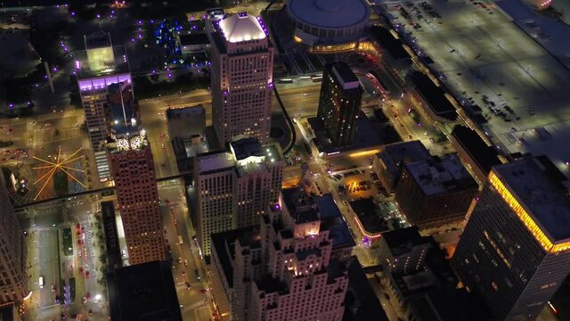 Aerial Flying Over Night Detroit, City Lights, Downtown, Michigan