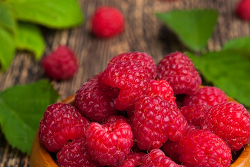 harvested red raspberries, close up