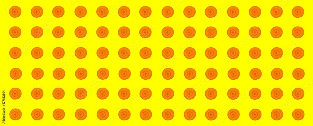 Aufkleber carrot slices pattern, top view of carrot slices isolated on yellow background.