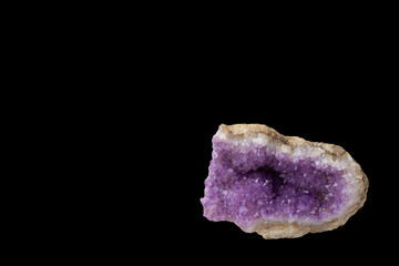 Gorgeous purple amethyst, isolate on black background.