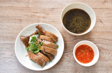 boiled duck meat in black soybean sauce dipping spicy chili sauce