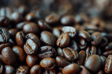 Roasted coffee beans background. Top view. Copy space 