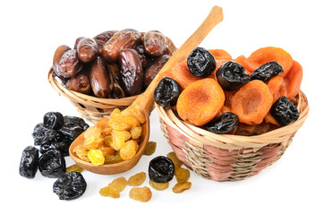 dried apricots in a basket and other dried fruits