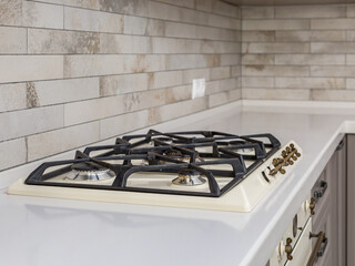 Modern gas stove in the kitchen. Kitchen design and interior. 	