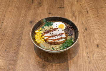 The Japanese chashu served in ramen bowls is actually braised in soy sauce, sake, and sugar at a low temperature; in which it is marinated in the sauce until serving time.