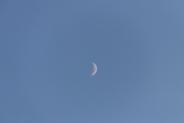 Beautiful moon on blue sky.