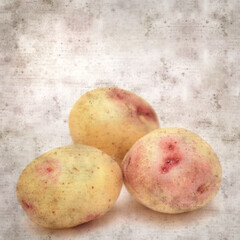 square stylish old textured paper background with new potatoes from Canary Islands
