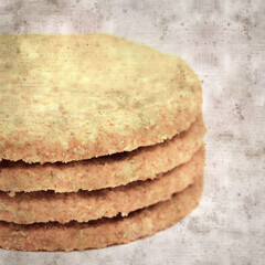 square stylish old textured paper background with round baked oatcakes