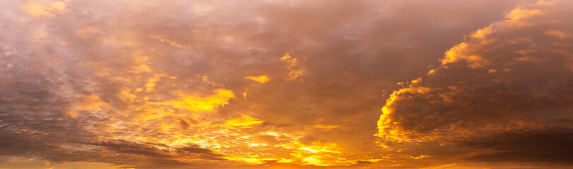 Panorama background of Cloudy sky and sunlight at golden hour time