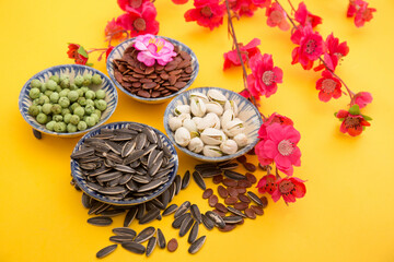 Tet Holiday, Lunar new year, chinese new year concept . Dried sunflower, lotus, watermelon and...