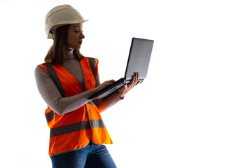 Woman geek. She works as a computer technician in production. Work as a system administrator. Girl in orange vest and a protective helmet. Girl engineer on a white background. Geek engineer career