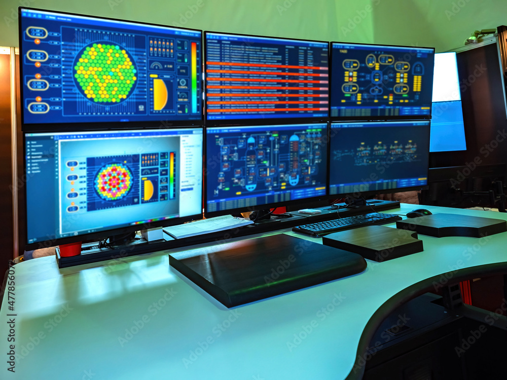 Poster production automation systems concept. production data are displayed on monitors. automation control