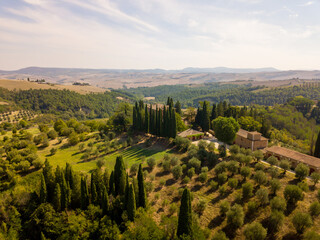 Tuscany panoramic aerial/drone view of tuscan villa with cypresses, Siena Italy