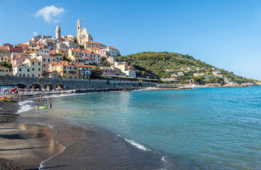 The beach of Cervo with his beautiful historic center in background