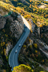 Aerial view of curve road with a car on the mountains. Croatia