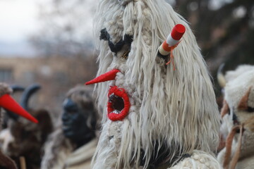 Godech, Bulgaria - January 1, 2022: Mummers in traditional costumes toured the streets of Godech on...