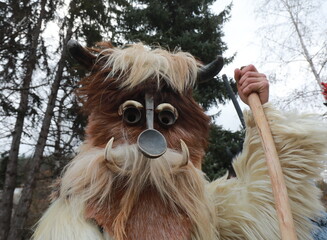 Godech, Bulgaria - January 1, 2022: Mummers in traditional costumes toured the streets of Godech on...