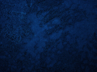 Dark rough cement wall background for graphic design or wallpaper.