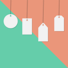 Clean white paper price tags or gift tags of various shapes. A set of labels with a cord.