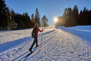 active woman, cross-country skiing  Bregenz Forest Mountains near Sulzberg, Vorarlberg, Austria 