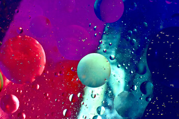 Bright transparent bubbles on a variegated background.