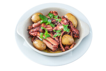 Traditional Portuguese dish of octopus and potatoes called polvo a lagareiro close-up on a white...