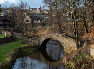 KEITH, MORAY, SCOTLAND - 31 DECEMBER 2021: This is the old Bridge over the River Isla in Keith,...