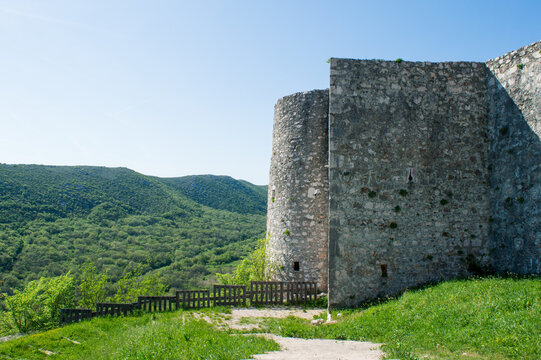 Medieval castle surrounded with forested mountains in Drivenik, Croatia