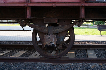 Fototapeta na wymiar Old and rusty railway wheels on rails