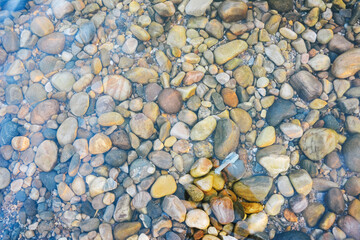 Pebbles underwater in a canal at Sadapahor, in Sylhet