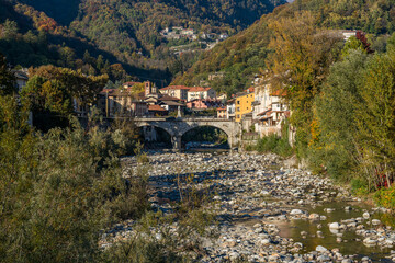 Fototapeta na wymiar The beautiful village of Varallo, during fall season, in Valsesia (Sesia Valley). Province of Vercelli, Piedmont, Italy.