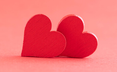 Hearts of fabric on a pink background. Time for lovers' day, Valentine's day.