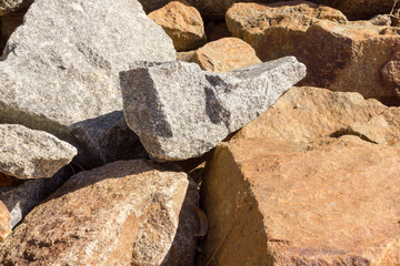 Natural stone background of granite and sandstone. Copy space.