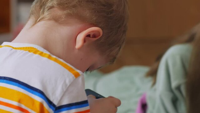 Boy and girl with phones close up