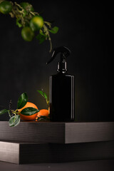 Air freshener bottle on a black background