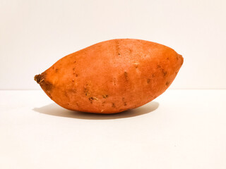 Sweet potato batata isolated on white background.