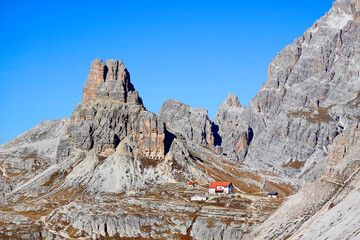 Alpine Mountain Hut in Sesto or Sexteen Dolomites called Rifugio Antonio Locatelli in front of Tre...