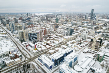 Naklejka na ściany i meble Yekaterinburg aerial panoramic view at Winter in cloudy day. Ekaterinburg is the fourth largest city in Russia located in the Eurasian continent on the border of Europe and Asia.