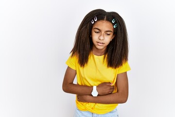 Young african american girl standing over white isolated background with hand on stomach because...