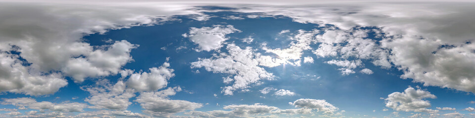 Obraz premium blue sky hdr 360 panorama with white beautiful clouds in seamless projection with zenith for use in 3d graphics or game development as sky dome or edit drone shot for sky replacement