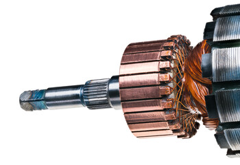 Detail of electrical DC motor rotor isolated on white background. Copper commutator and coil wire winding attached to steel laminations of blender engine with grooving for fan and square end of shaft.