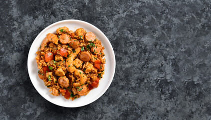 Creole jambalaya with chicken, smoked sausages and vegetables